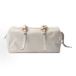 A medium-sized white women\'s handbag with a classic long-handled design from the PRADA Dangle brand